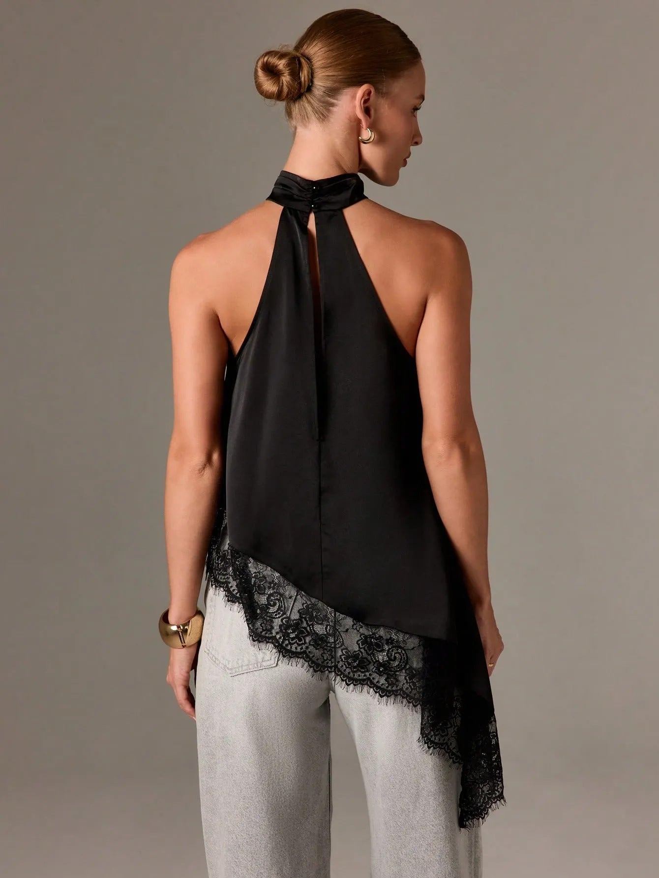 Sleeveless lace-trimmed asymmetrical halter-neck satin vest