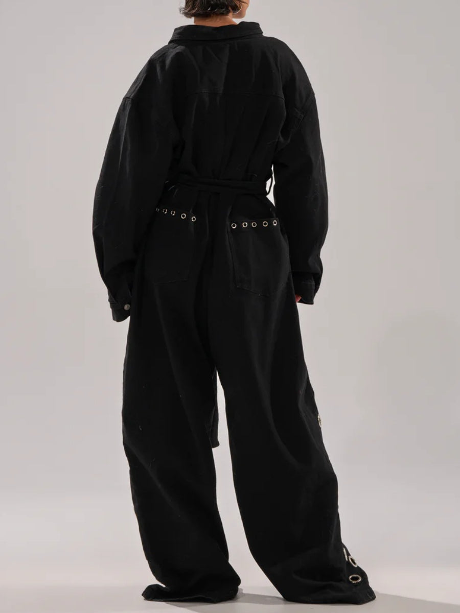 DENIM JUMPSUIT WITH GROMMETS