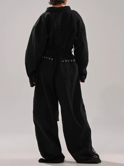 DENIM JUMPSUIT WITH GROMMETS